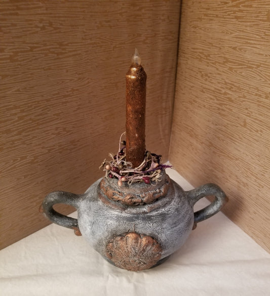 Two handle pot with candle