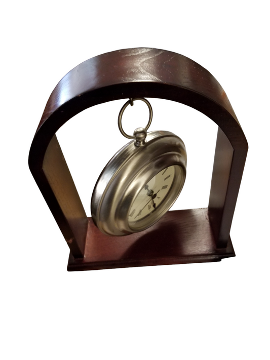 Hanging clock in wood frame