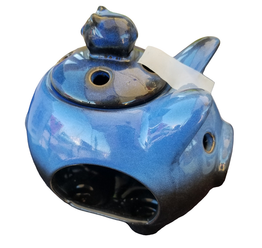 Ceramic candle melt pig