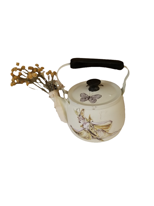 Tea pot with fairy decor