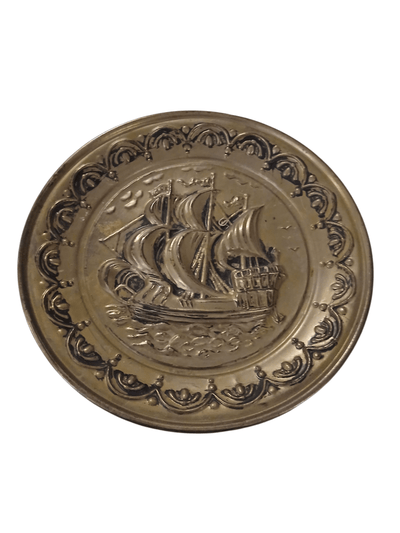 Brass ship wall decor - The Creative Shed - Decor - The Creative Shed - Decorative brass plate with ship design on a white background - 