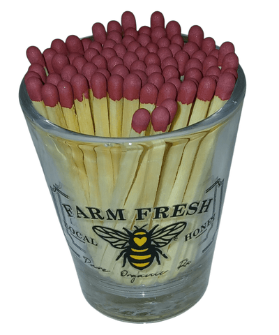 Clear shot glass with matches - The Creative Shed - The Creative Shed - Glass container filled with matches labeled 'Farm Fresh Honey' on a white background - 