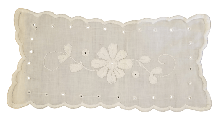 Embroidered floral furniture scarf - The Creative Shed - The Creative Shed - A white linen furniture scarf with embroidered floral patterns and stitching around the edges. - 