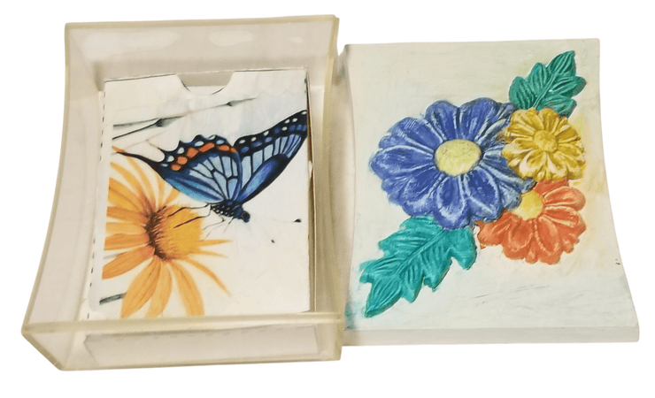 Floral Playing card box with cards - The Creative Shed - Decor - The Creative Shed - A painted wooden box with floral designs opened to show playing cards with floral and butterfly motifs. - 