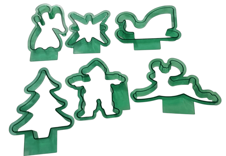 Green plastic cookie cutters - The Creative Shed - The Creative Shed - Set of green cookie cutters with various shapes on a white background - 