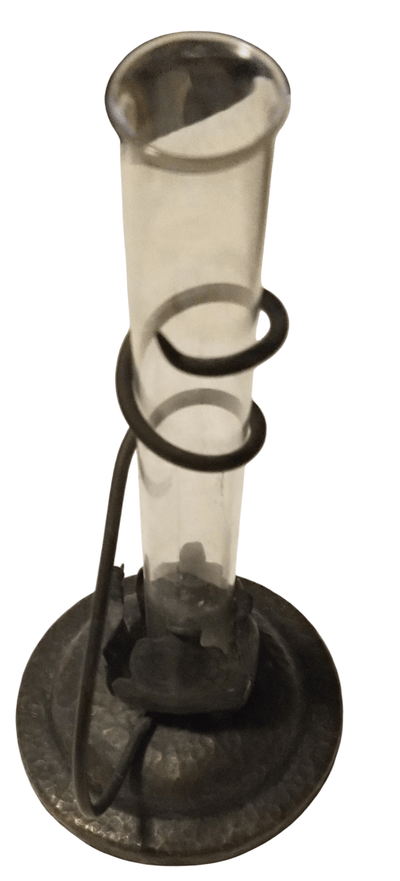 Metal Floral vase - The Creative Shed - The Creative Shed - A metal floral vase with a cylindrical glass vase placed inside it, featuring a black metal base and stand. - 