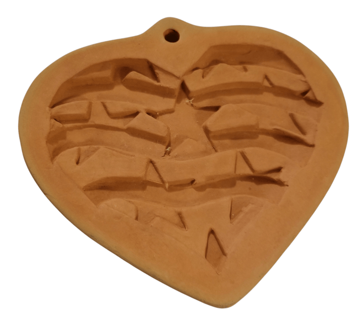 Terra Cotta Cookie Mold/Patriotic Heart - The Creative Shed - The Creative Shed - A terracotta cookie mold in the shape of a heart with indented details resembling a patriotic star pattern. - 