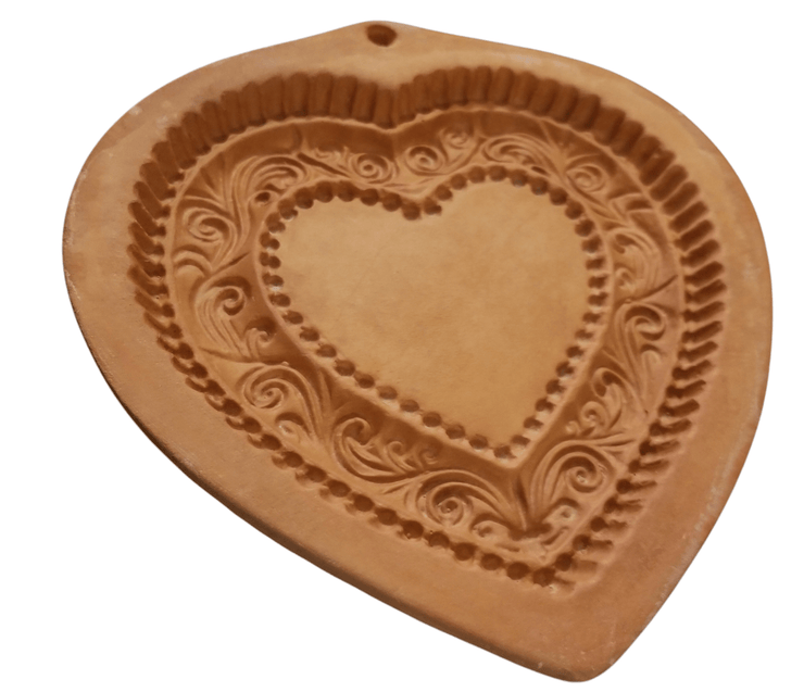 Terra Cotta Cotton Press Mold/Heart 1 - The Creative Shed - The Creative Shed - A terracotta colored cotton press mold in the shape of a heart with intricate embossed patterns. - 